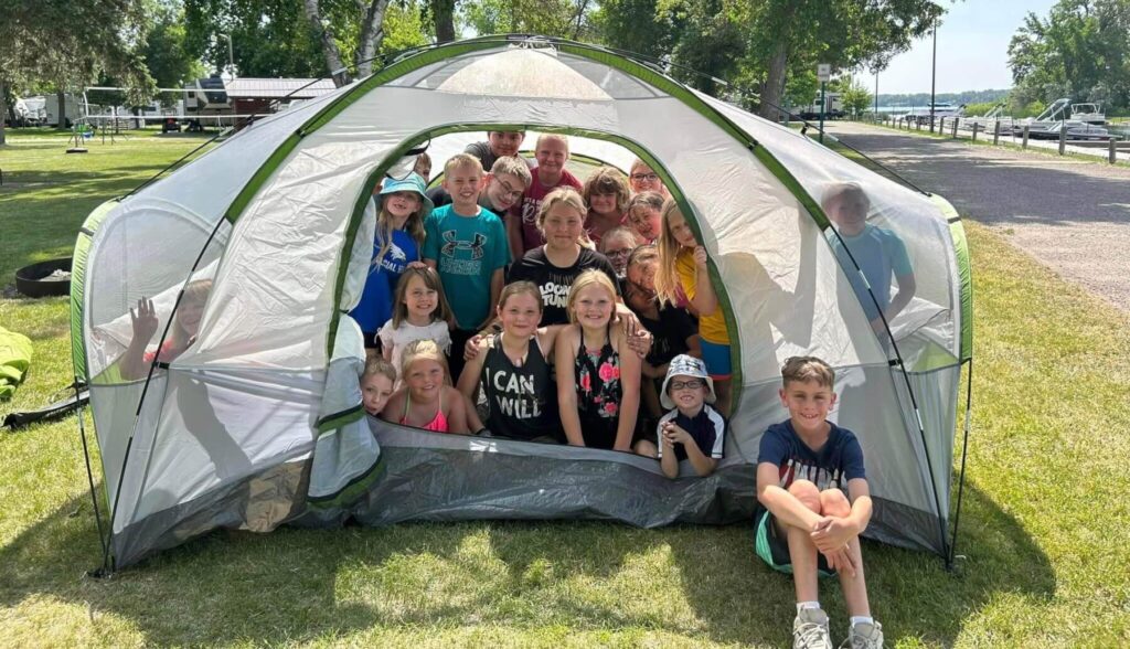 A group of Glacial Hills Elementary School students in a tent