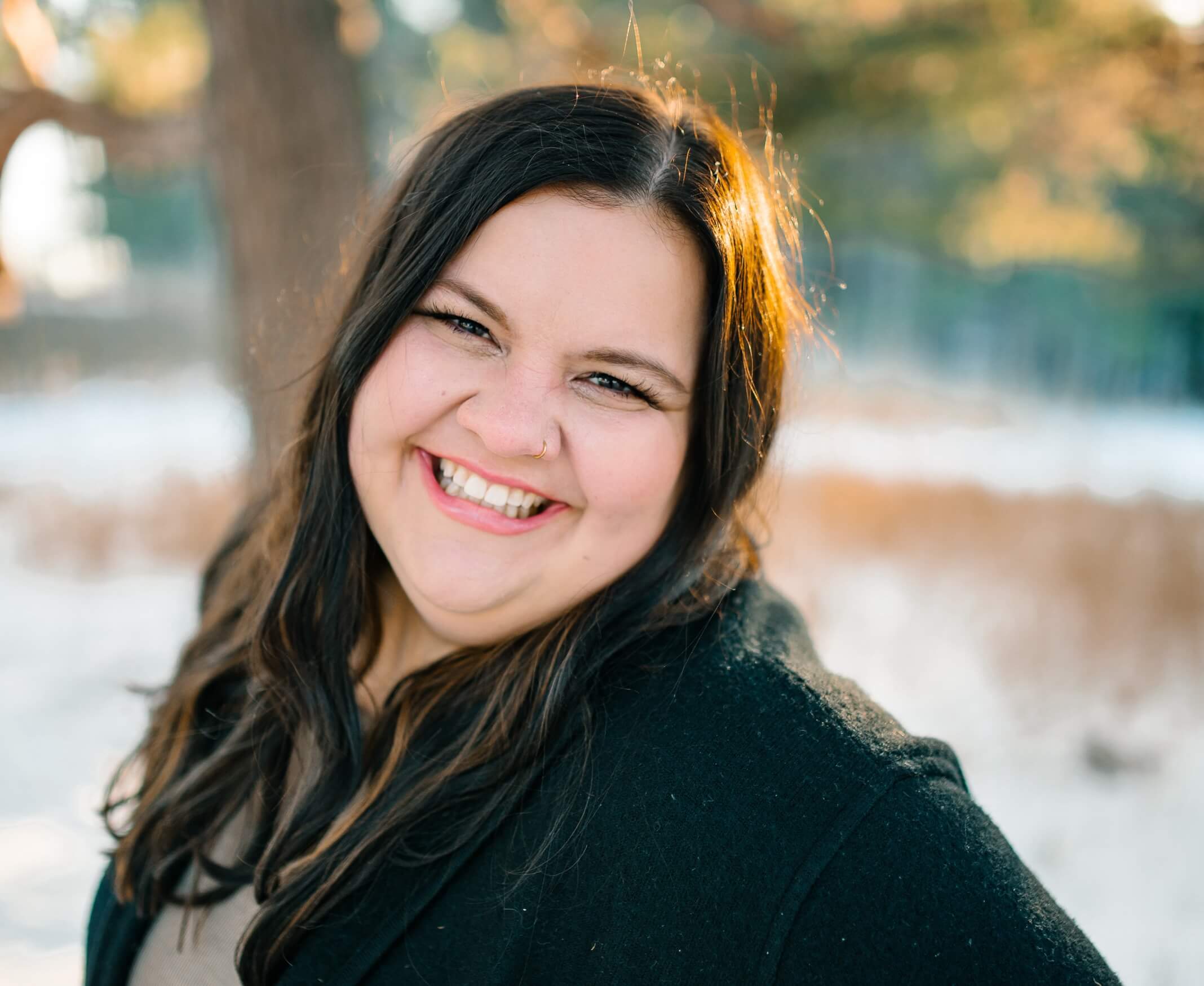 Twyla Myrin, new owner of Market on Main, smiles on a sunny winter day.