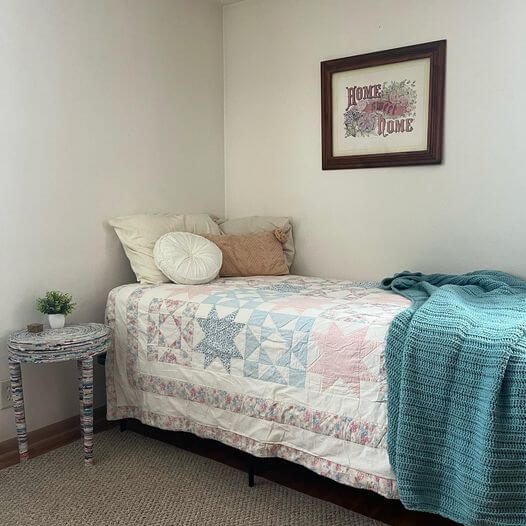 Barbara House room with bed and pillows.