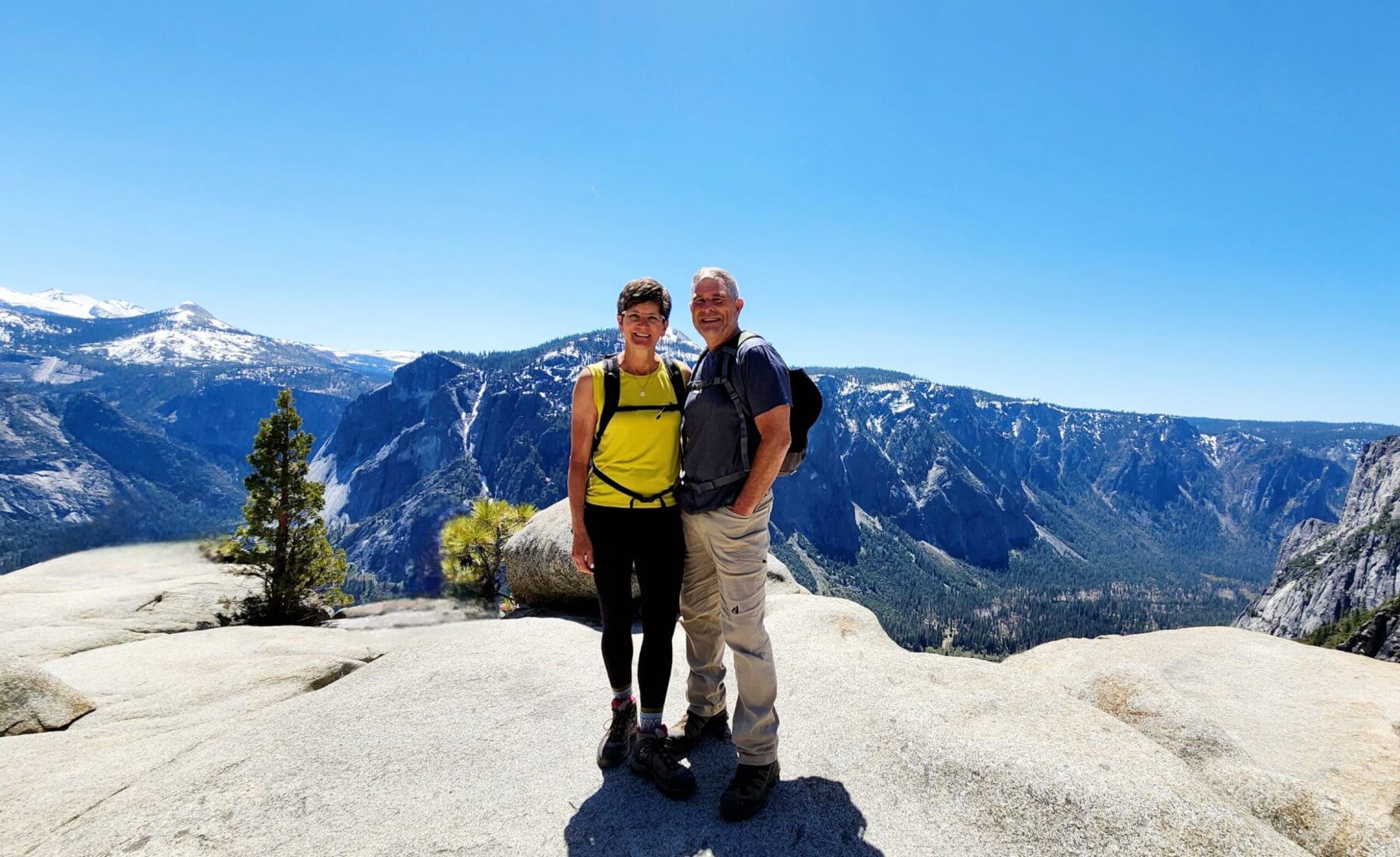 Dan and Lisa Malmstrom on a mountain top.